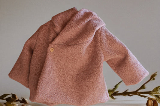Próximamente chaqueta infantil de lana natural rosa nude- Colección Orígenes
