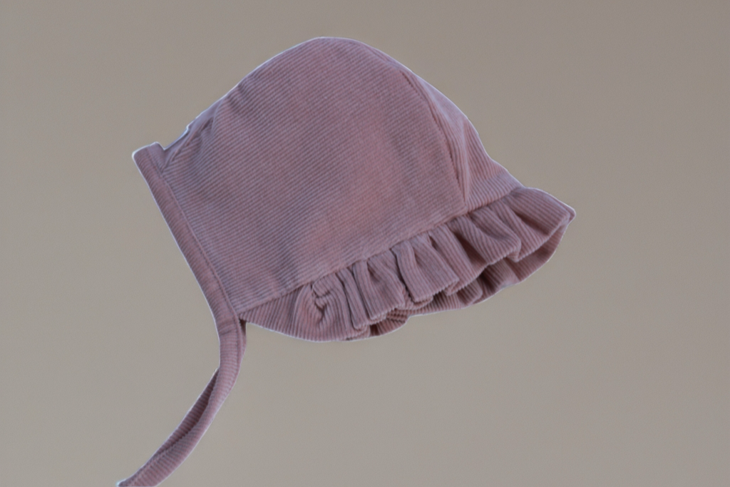 Capota rosa nude con volante- Colección Orígenes